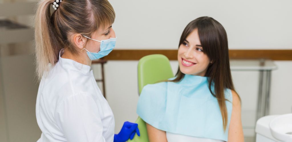 How to Choose a Private Dentist in Birmingham (2026 Guide) 2 patient consulting with a private dentist in Birmingham during a routine dental appointment